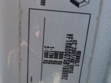 a close up of a label on the side of a refrigerator