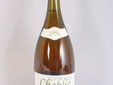 a bottle of wine that is sitting on a table