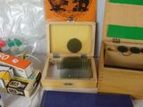 a small wooden box with a picture of a man on it