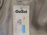 an image of a close up of a shirt with a tag on it