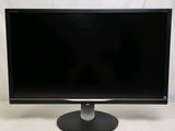 the computer monitor is sitting on a stand on a white surface