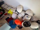a lot of stuff on the floor in the room