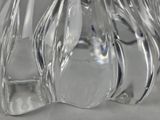 a glass vase that is sitting on a table