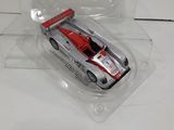 a plastic box with a toy car inside of it