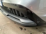 a close up of the front bumper of a car