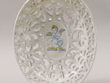 a white plate with a picture of a person on it