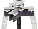 a close up of a clamp on a white background