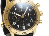 an image of a black and gold watch on a black leather strap