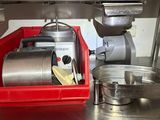 an image of a kitchen with a mixer and a bowl on the counter