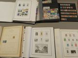 a lot of different stamps on the pages of a book