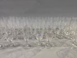 a lot of empty wine glasses sitting on a table