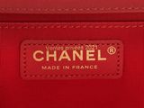a chanel red leather shoulder bag with gold hardware