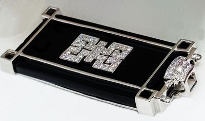a black and silver case with some diamonds on it