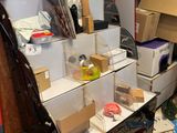 a room that has a lot of boxes and other things on the floor