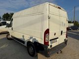 a white van that is parked in a parking lot