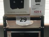 a shelf that has two speakers on top of it