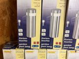 several boxes of aquarium lights are stacked on top of each other