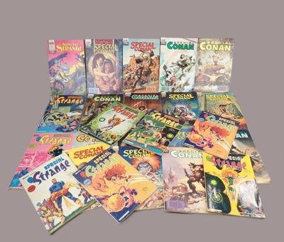 a lot of comic books that are on the table