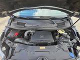 the engine of a car with its hood open and the hood open