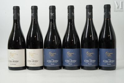 six bouteilles de vin sont alignées sur une table
