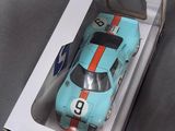 a box with a toy car in it on a table