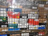 a metal cage filled with many different types of boxes