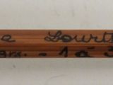 a close up of a baseball bat with writing on it