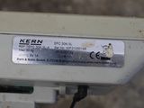a close up of a sewing machine with a label on it