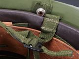 a close up of a helmet with a strap on it