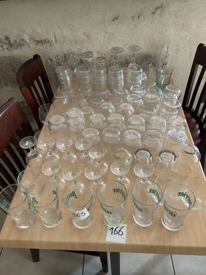 a lot of empty wine glasses on the table