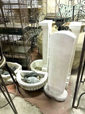 a bird cage with a bird inside of it