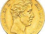 a close up of a gold coin with a woman ' s face on it