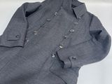 grey dress shirt with buttons on the chest and long sleeves