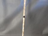 an image of a baseball bat on a gray background