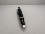 an image of a pen laying on a table