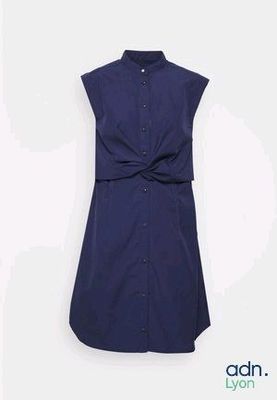 navy blue sleeveless dress with a bow