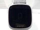 a close up of a smart watch on a table