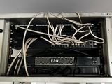 a rack with a bunch of wires in it