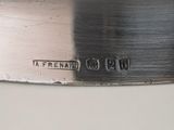 a close up of a knife on a table