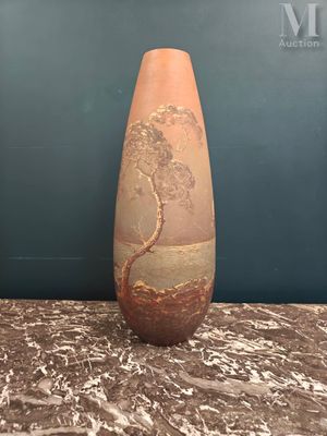two vases sitting on a table with a wall in the background