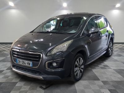 a picture of a grey car parked in a garage