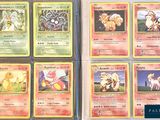 several pokemon cards are displayed on a table in front of each other