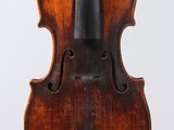 an old violin with a bow on a white background
