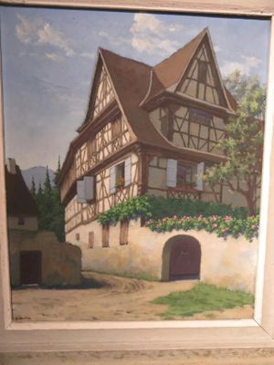 a picture of a painting of a house on the wall