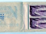 a picture of a purple and black stamp with a picture of a cat