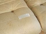 a patch of tape on the back of a couch