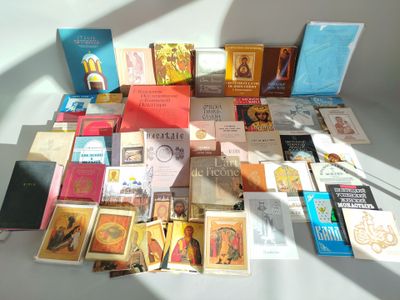 many different types of religious books on the table