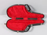 a red case with a black handle inside of it