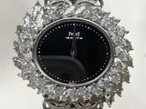 a close up of a wrist watch with diamonds on it