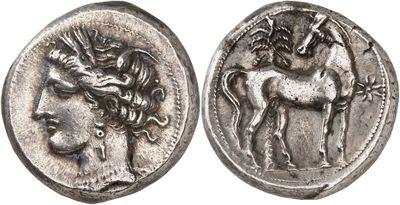 a silver coin with an image of a horse and a man on it